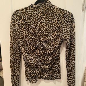 Cheetah ruffle turtle neck